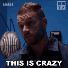a man says " this is crazy " in front of a sign that says sistas
