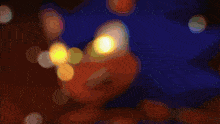 a close up of a sonic the hedgehog 's face with green eyes