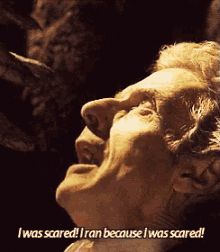 a close up of a man 's face with the words i was scared i ran because i was scared written below