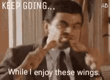 Mr Bean Keep Going Wings GIF - Mr Bean Keep Going Wings Eating Chicken GIFs