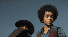 a man and a woman standing next to each other