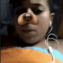 a woman wearing earbuds and a fake nose