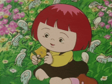 a little girl with red hair is sitting in a field of flowers holding a flower