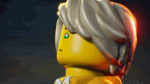 a close up of a lego figure with gray hair and a green eye