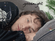 a man laying on a couch with the word goodnight written on the bottom