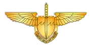 a badge with wings and a sword that says " cepat bersiap pasti "