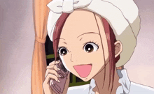 a girl with a towel on her head is talking on a phone