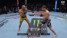 mitchell and silva are fighting in a boxing match