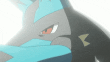 a close up of a pokemon 's face with red eyes