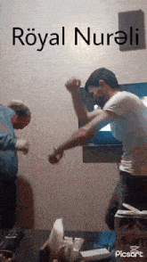 two men are dancing in front of a tv and the words royal nurali are on the bottom