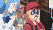 two anime girls are eating ice cream and one is wearing a red hat