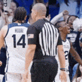 a basketball player with the number 14 on his back