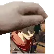 a close up of a person 's hand holding a picture of a man .