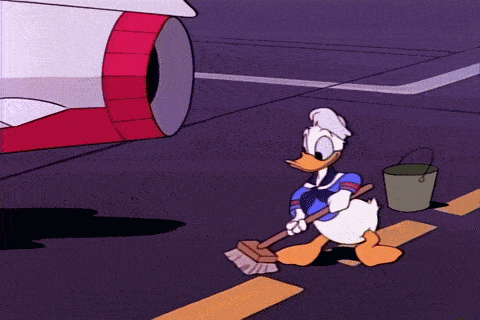 Donald, cleaning the floor, looks into a jet engine and gets burned