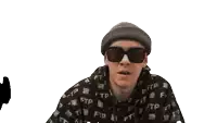 a man wearing sunglasses and a beanie says ftp on his shirt