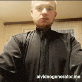 a man wearing a black shirt with aivideogenerator.me written on the bottom