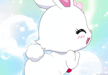 a white rabbit with a pink flower on its ear is smiling in a cartoon
