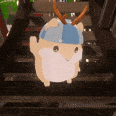 a cartoon hamster wearing a blue and white hat with antlers