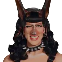 a woman wearing bunny ears and a spiked collar is smiling