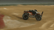 a monster truck with the word ninja on the side of it