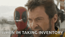 a man with a beard and a deadpool mask is standing next to a man with a beard and a beard .