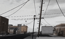 a black and white painting of a city street with telephone poles and buildings .