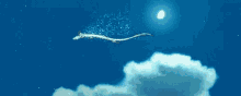a dragon is flying through a blue sky with a full moon behind it .