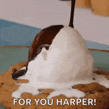 a cookie with a scoop of ice cream on top and the words for you harper written below it