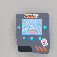 a tamacorp video game shows a cat sleeping on a bed