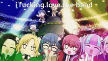 a group of anime characters are standing next to each other in front of a stage .