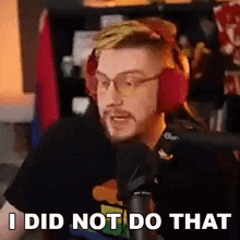 a man wearing headphones and glasses says i did not do that .