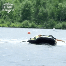 Holding On To The Inflatable Boat Julie Tower GIF - Holding On To The Inflatable Boat Julie Tower Canadas Ultimate Challenge GIFs