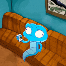 a cartoon character is sitting on a couch and holding a remote control