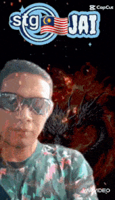 a man wearing sunglasses and headphones is on a screen that says ' stg jai '