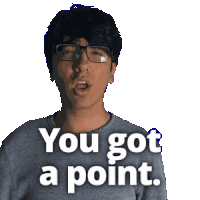 a man wearing glasses and a gray shirt says you got a point
