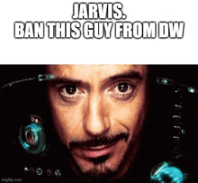 a close up of a man 's face with jarvis ban this guy from dw written on it
