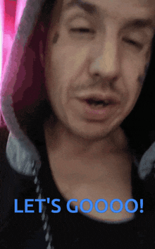 a man with his eyes closed and the words let 's goooo