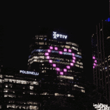 a tall building with the word optiv on it