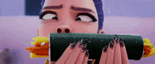 a woman with black nail polish is eating a sushi roll