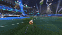 a rocket league game is being played on a soccer field