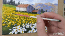 a painting of a field of yellow and white flowers with a barn in the background