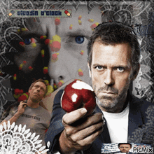 a man is holding a red apple with a bite taken out of it while wearing a shirt that says " anybody lies "
