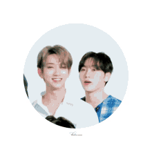 two young men are looking at each other in a white circle with the word lucas on the bottom right corner