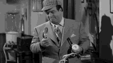 Shrugging Lou Francis GIF - Shrugging Lou Francis Abbott And Costello Meet The Invisible Man GIFs