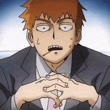 a man in a suit and tie has a cigarette in his mouth