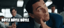 a man in a suit and tie is making a funny face with the words boyle boyle boyle written in black
