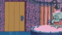 squidward from spongebob squarepants is in a bathtub full of pink foam .