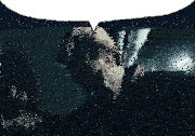 a man in a dark room with a speech bubble behind him