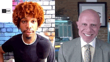a man with curly hair and a bald man in a suit are sitting next to each other .
