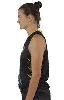 a female basketball player wearing a black jersey with the number 9 on it